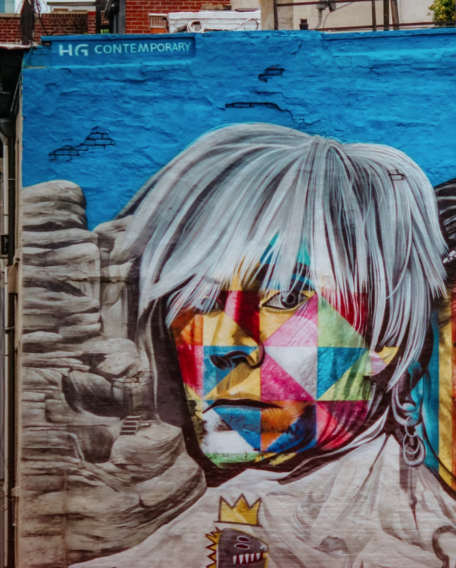 Part of a mural with Andy Warhol’s face. Photo by Jon Tyson.