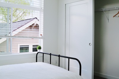 white bedroom, open window