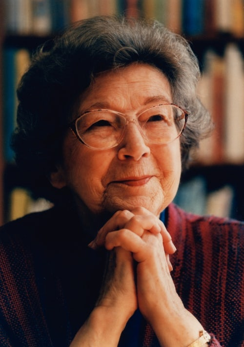 Beverly Cleary leans her chin on clasped hands.